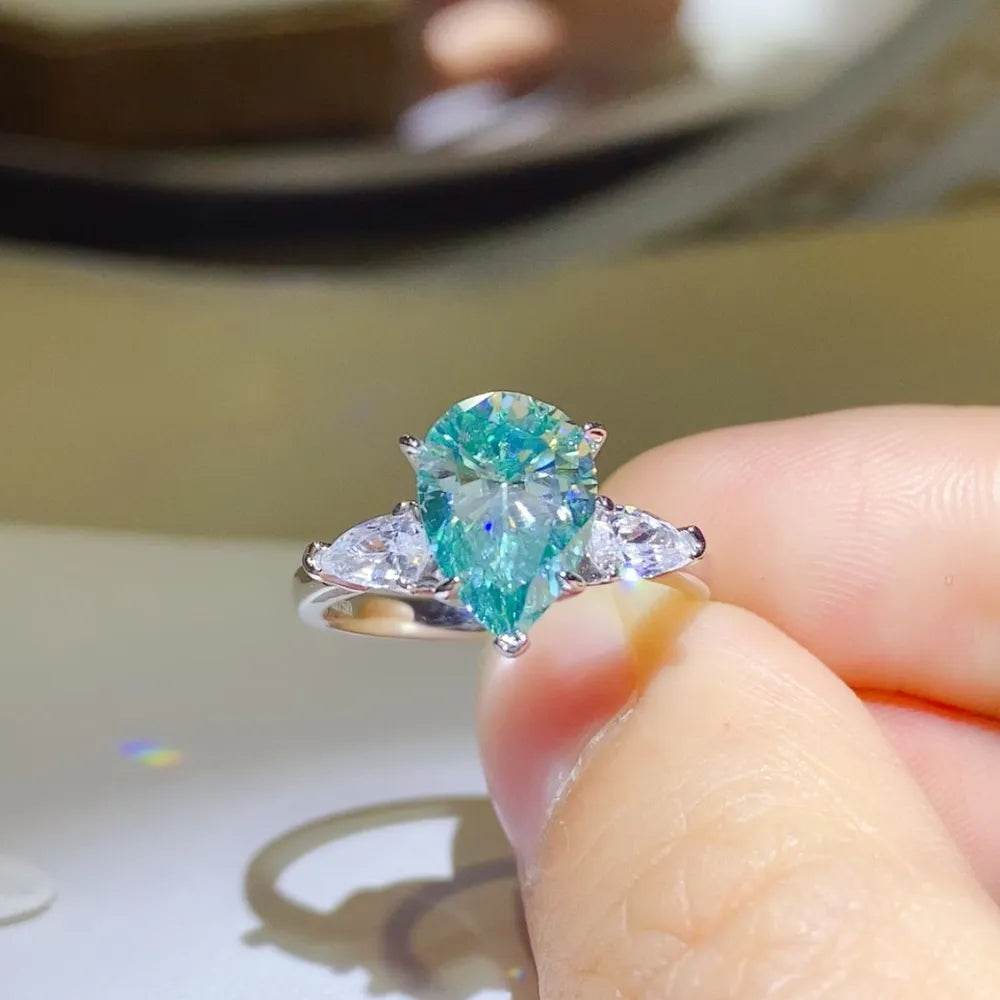 2 Carat Blue Moissanite Ring - Sterling Silver Pear Cut Three Stone Design - Patelcreations