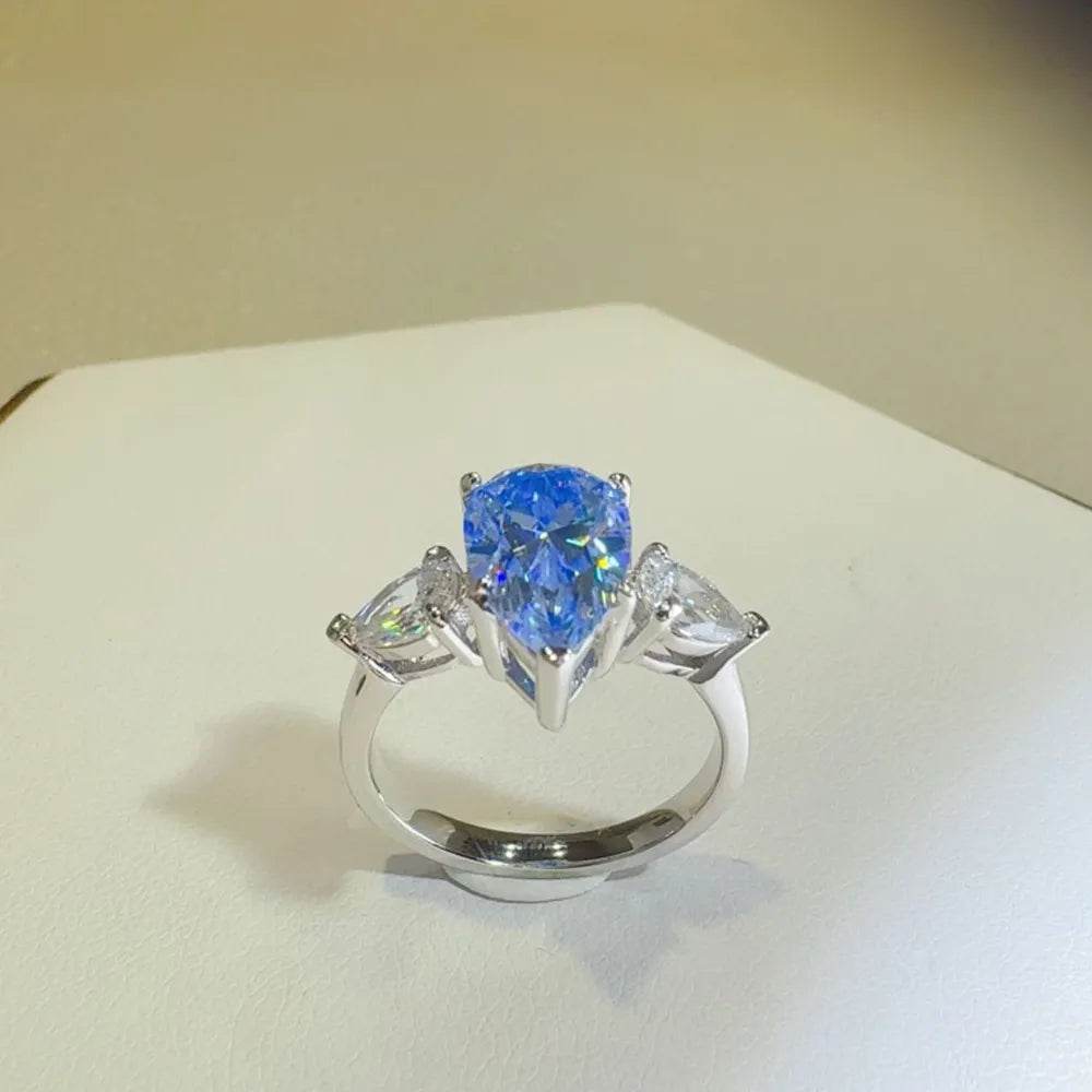 2 Carat Blue Moissanite Ring - Sterling Silver Pear Cut Three Stone Design - Patelcreations