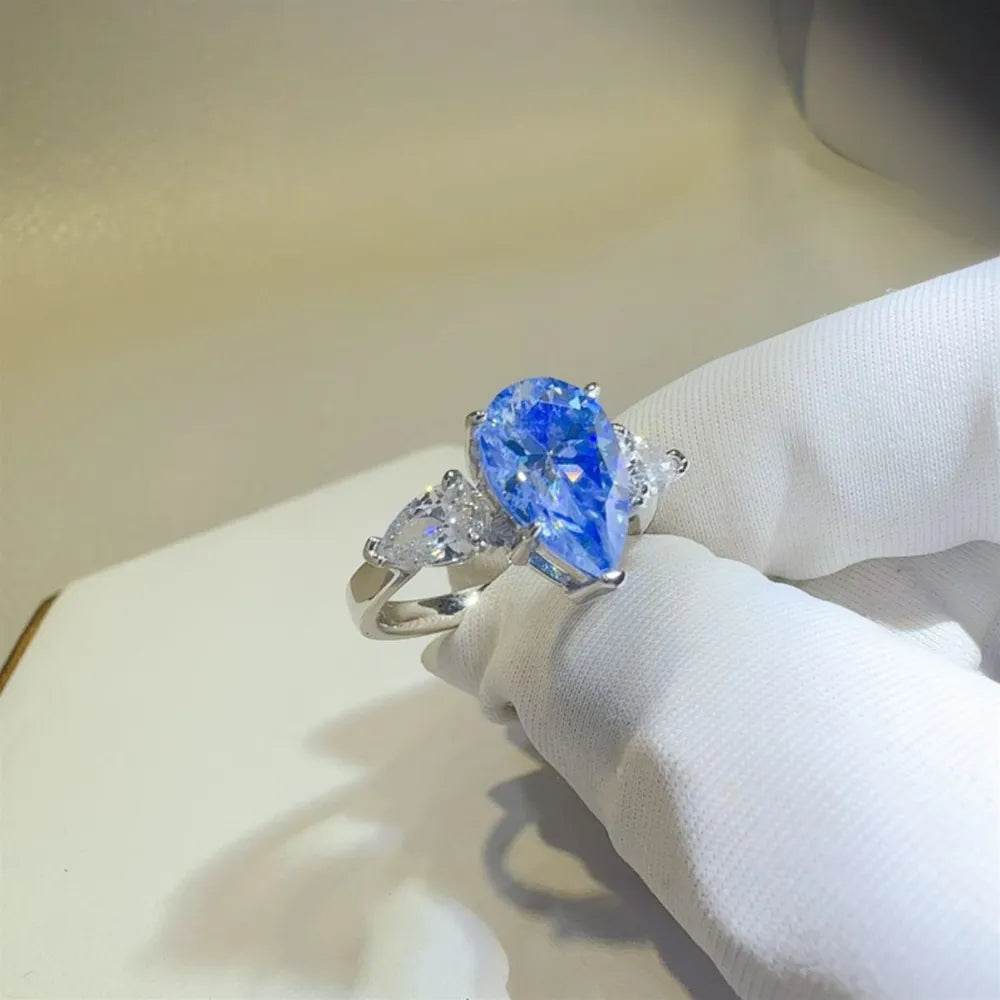 2 Carat Blue Moissanite Ring - Sterling Silver Pear Cut Three Stone Design - Patelcreations