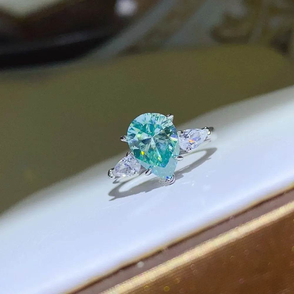 2 Carat Blue Moissanite Ring - Sterling Silver Pear Cut Three Stone Design - Patelcreations
