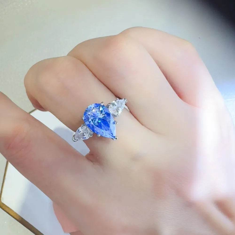 2 Carat Blue Moissanite Ring - Sterling Silver Pear Cut Three Stone Design - Patelcreations