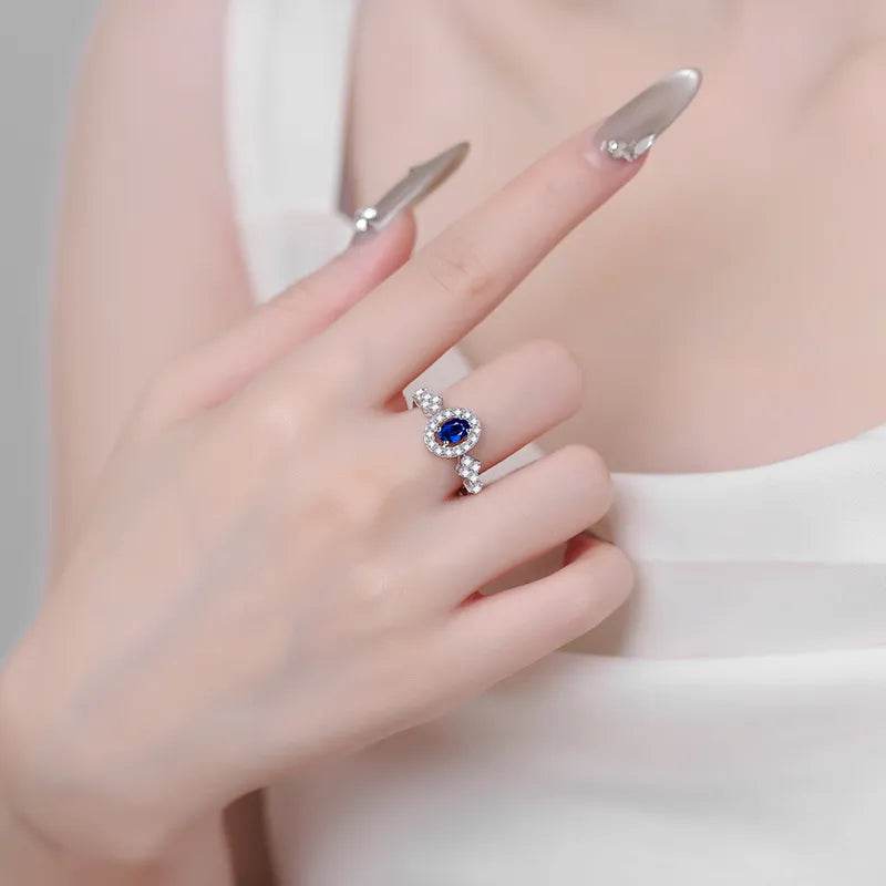 0.5 Carat Blue Moissanite Ring - Sterling Silver Oval Halo Design - Patelcreations