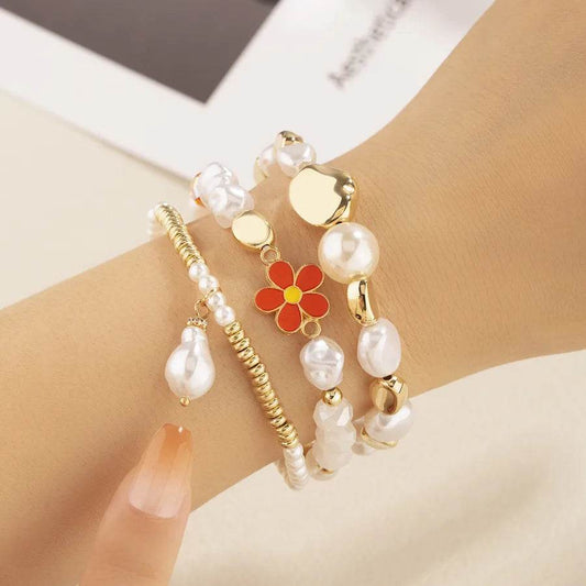 Pearl & Gold Bracelet Set - 3 Piece White Pearl Stack with Flower Charm & Heart Accents - Patelcreations