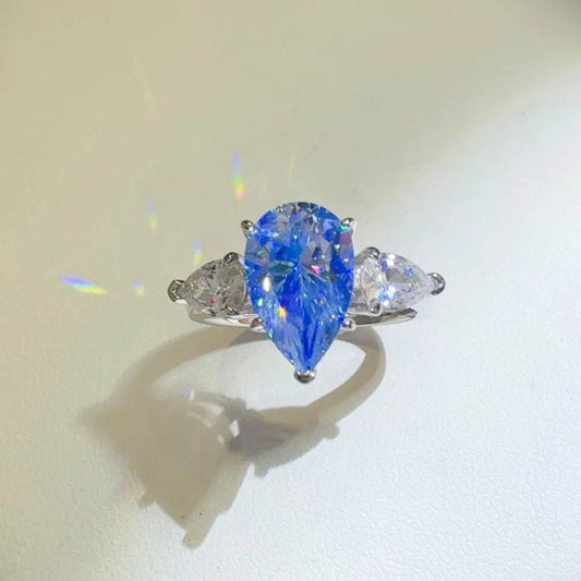 2 Carat Blue Moissanite Ring - Sterling Silver Pear Cut Three Stone Design - Patelcreations