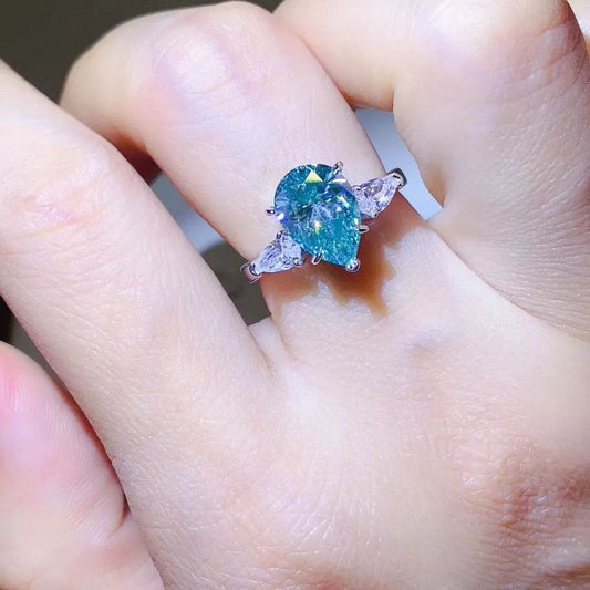 2 Carat Blue Moissanite Ring - Sterling Silver Pear Cut Three Stone Design - Patelcreations