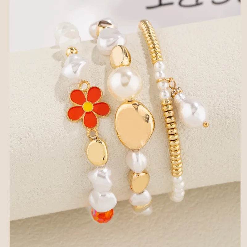 Pearl & Gold Bracelet Set - 3 Piece White Pearl Stack with Flower Charm & Heart Accents - Patelcreations